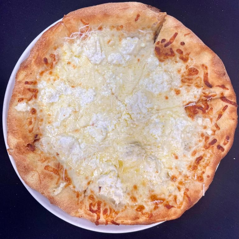 Savor Our Authentic Pizza